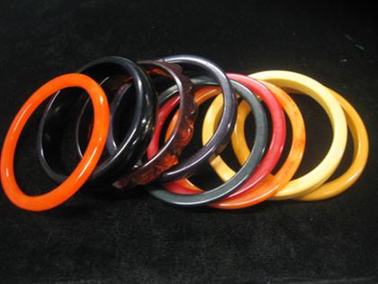 Appraisal: Group of nine bakelite bangle bracelets Multi-colored set of varying