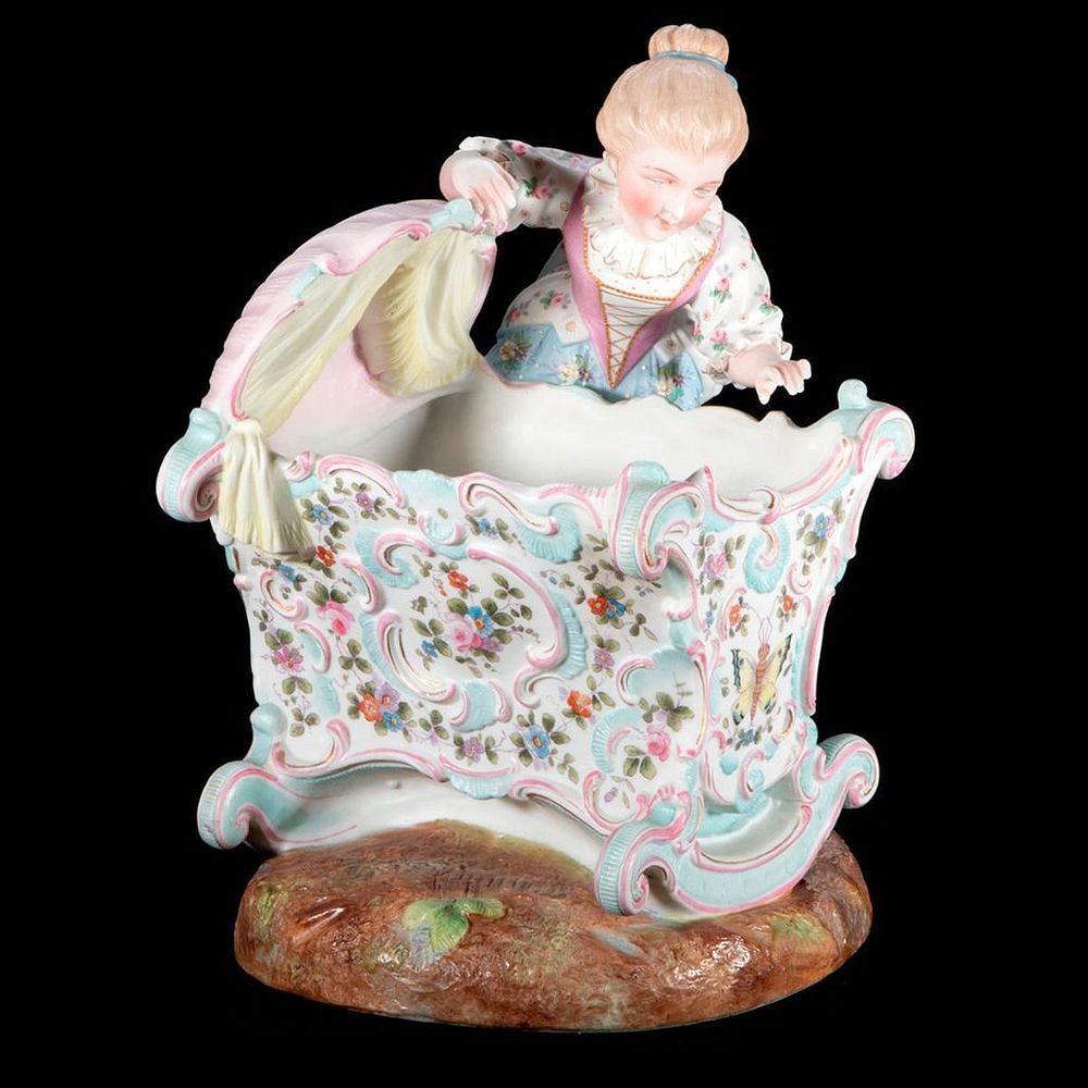 Appraisal: Porcelain mother and crib A continental bisque mother and crib