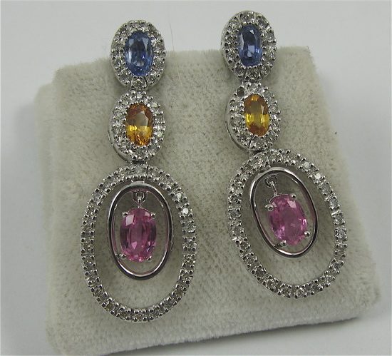 Appraisal: PAIR OF FANCY SAPPHIRE AND K GOLD EARRINGS with appraisal