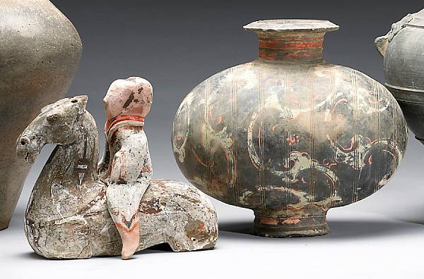 Appraisal: Two painted grey pottery burial wares Han Dynasty The first