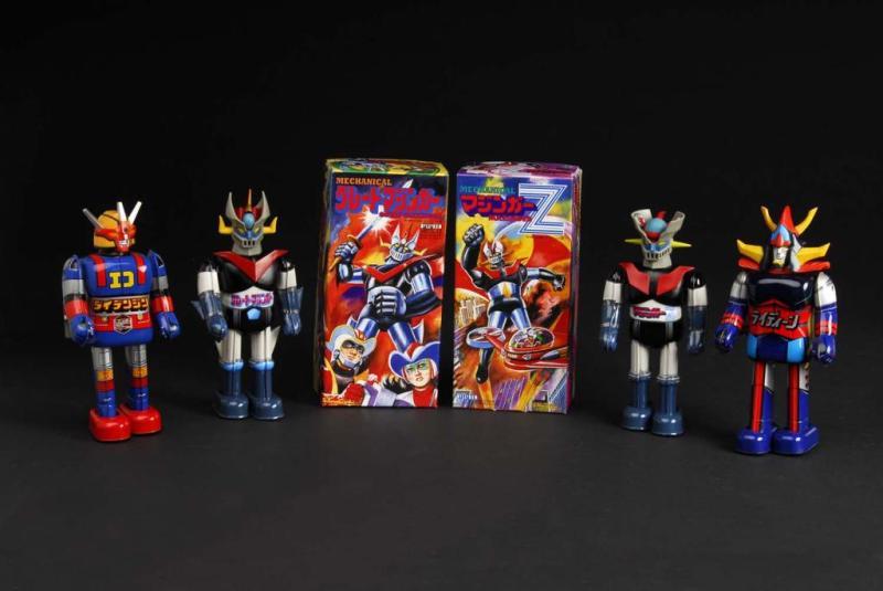 Appraisal: Lot of Tin Mazinger Superhero Wind-Up Toys Description Japanese One