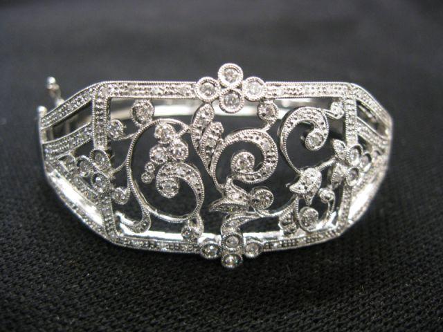 Appraisal: Diamond Bracelet fancy hinged bangle style loaded with diamonds totaling