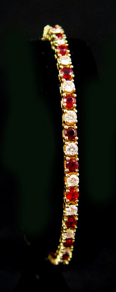 Appraisal: K RUBY DIAMOND TENNIS LINE BRACELET diamonds alternating with rubies