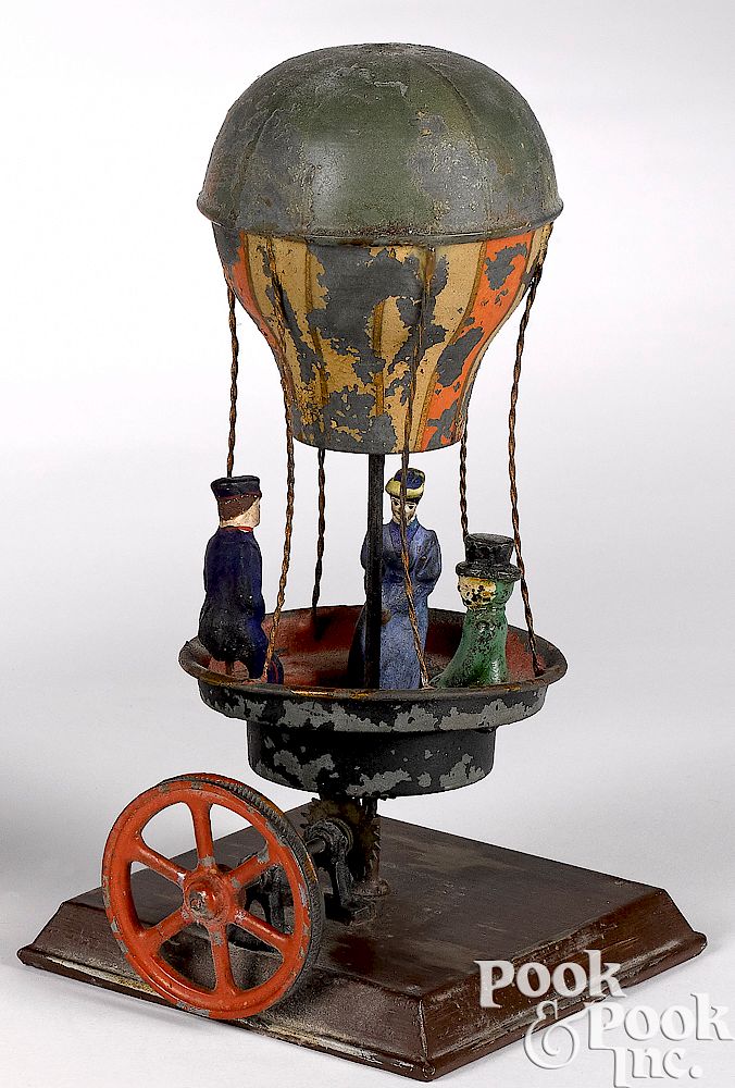 Appraisal: Schoenner hot air balloon carousel steam toy Schoenner painted tin