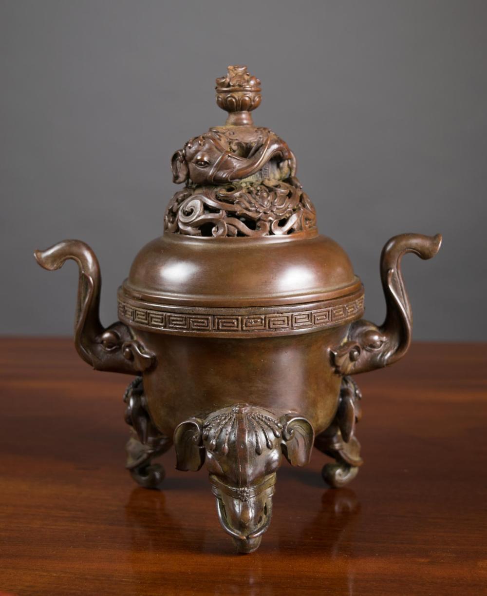 Appraisal: CHINESE BRONZE LIDDED CENSER of circular form with conforming reticulated