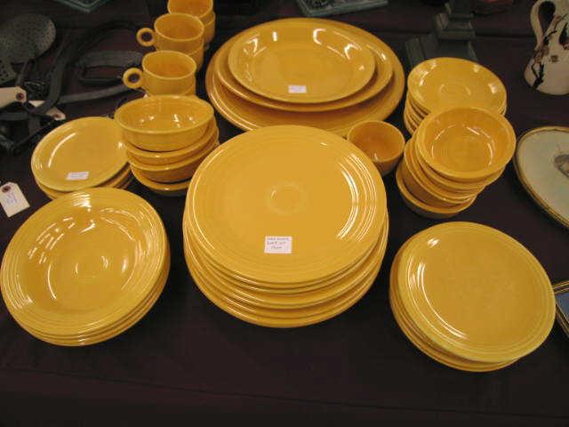 Appraisal: Pcs Yellow Fiesta Pottery by Homer Laughlin plates bowls cups