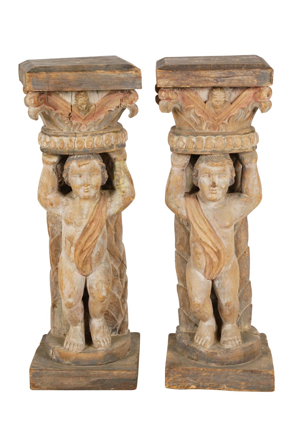 Appraisal: PAIR OF FIGURAL PEDESTALSbleached wood depicting robed figures lifting base