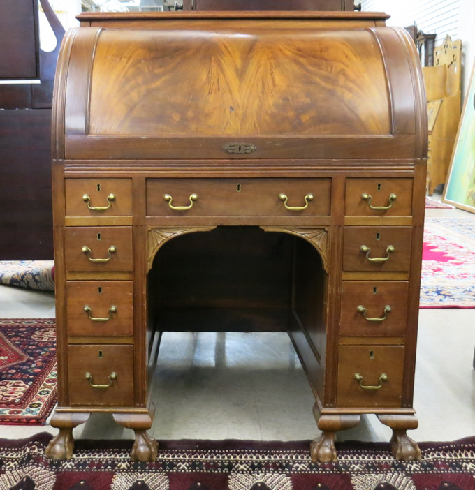 Appraisal: LATE VICTORIAN MAHOGANY CYLINDER-ROLL KNEEHOLE DESK Chippendale Revival substyle American