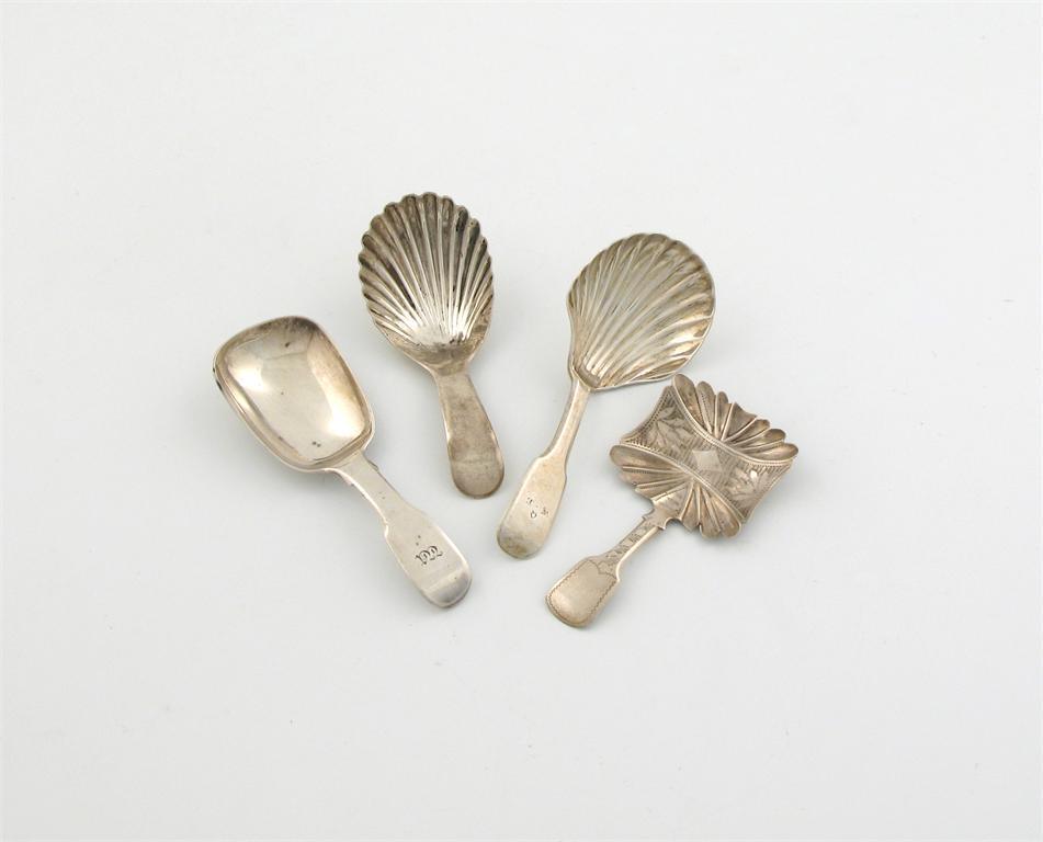 Appraisal: A collection of four antique silver caddy spoons