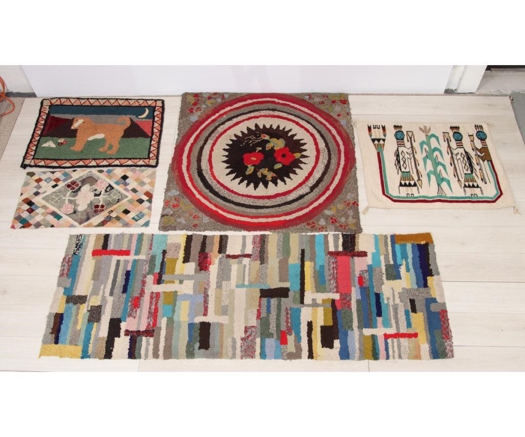 Appraisal: Four hooked rugs to include a rectangular example with a