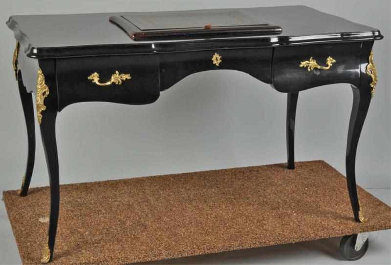 Appraisal: Black Lacquered Desk with Drawers Description Circa With brass mountings