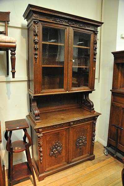 Appraisal: A LATE TH CENTURY ORNATELY CARVED OAK BOOKCASE CABINET IN