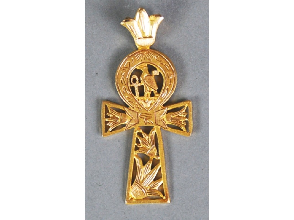 Appraisal: PROBABLY EGYPTIAN GOLD PIERCED CROSS PENDANT decorated with a bird