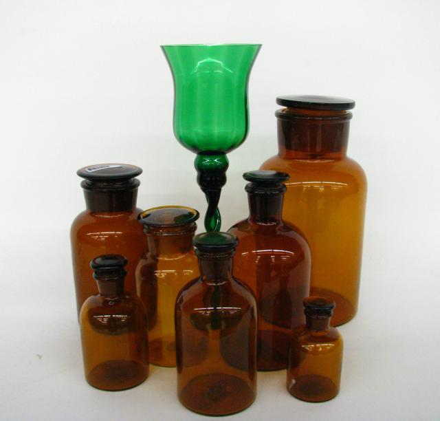 Appraisal: Group of seven amber glass lidded jars graduating in sizes