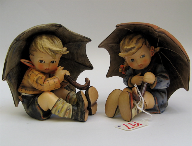 Appraisal: PAIR GERMAN HUMMEL FIGURES both TM- Umbrella Boy HUM O