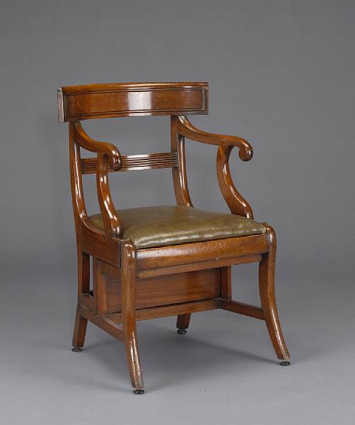 Appraisal: A Regency metamorphic library chair early th century The curved