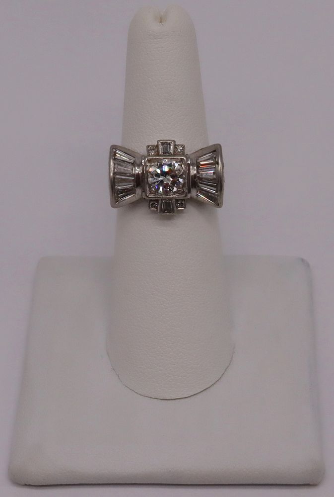 Appraisal: JEWELRY Platinum and Diamond Bow Form Ring Platinum bow form