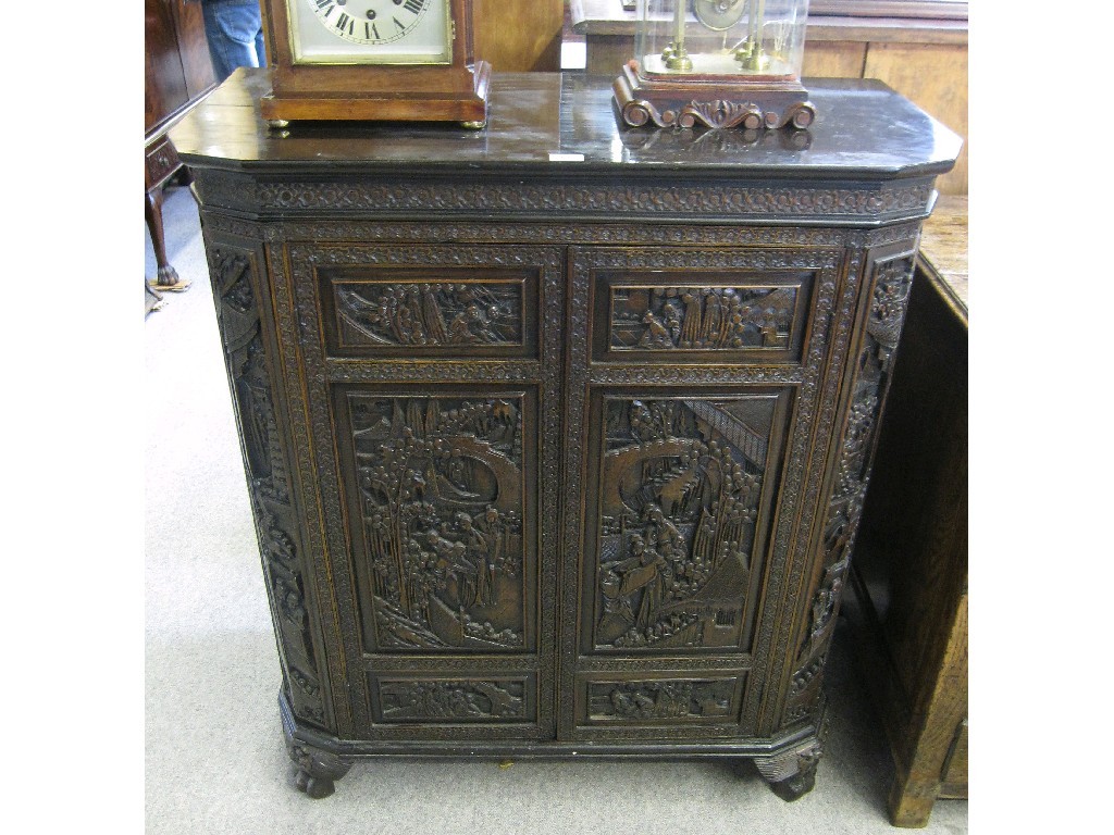 Appraisal: Oriental carved hardwood drinks cabinet