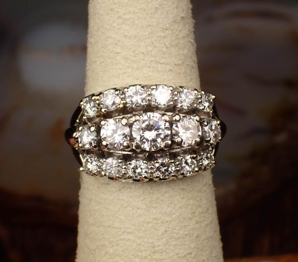 Appraisal: ESTATE DIAMOND AND FOURTEEN KARAT WHITE GOLD RING with round-cut