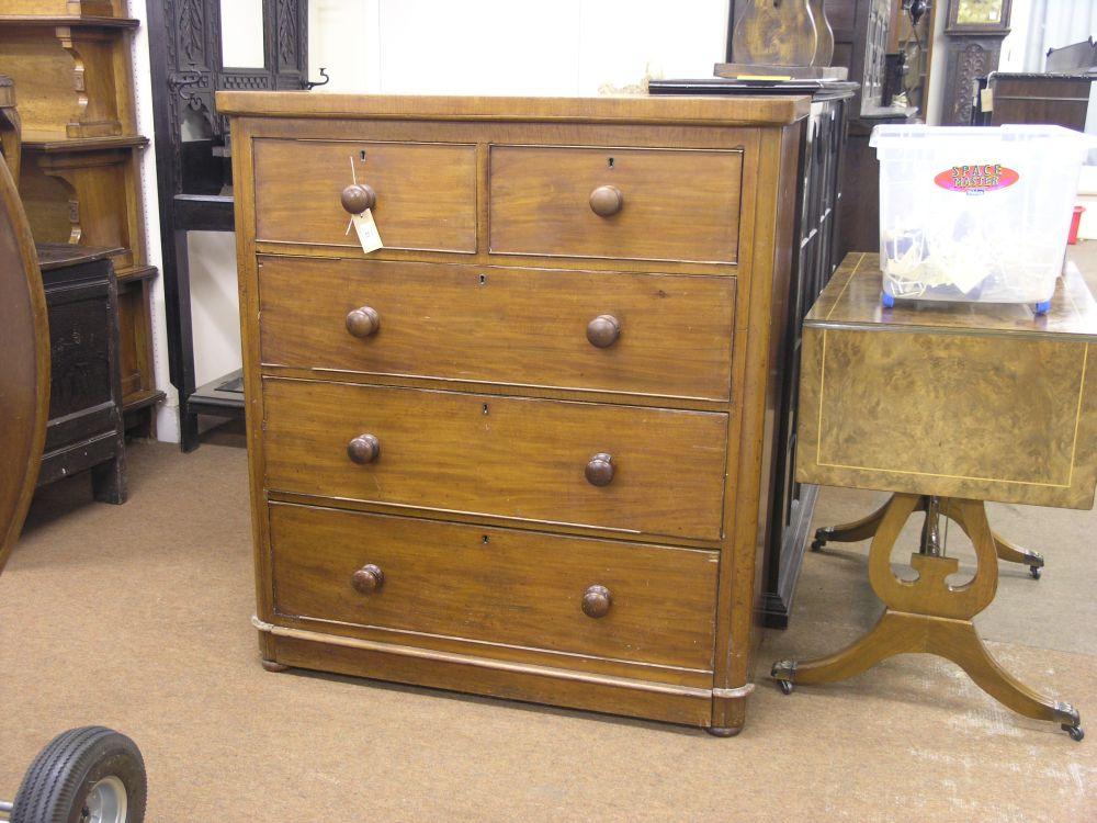 Appraisal: A Victorian mahogany chest two short and three long cock-beaded