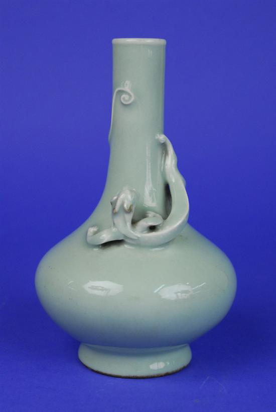 Appraisal: CHINESE CELADON CHILONG VASE Qing Dynasty of compressed globular form