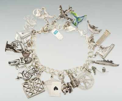 Appraisal: A Sterling Silver Charm Bracelet Sterling silver charm bracelet set