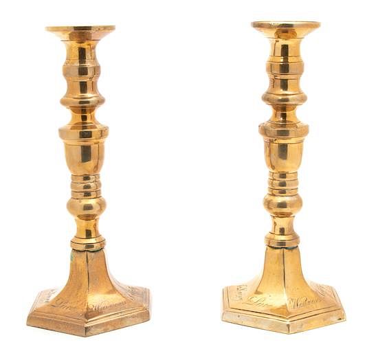 Appraisal: A Pair of Irish Brass Candlesticks A Pair of Irish