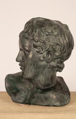 Appraisal: A contemporary plaster bust of a Classical youth painted to