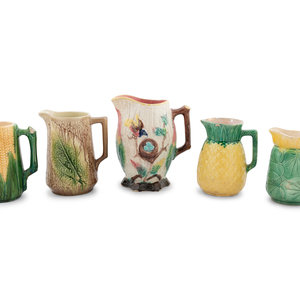 Appraisal: A Group of Nine Majolica Pitchers includes a tobacco leaf