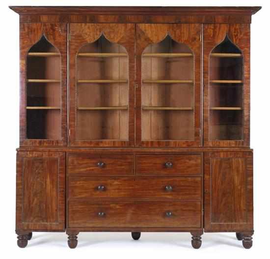 Appraisal: A WILLIAM IV MAHOGANY LIBRARY BOOKCASE With a stepped rectangular