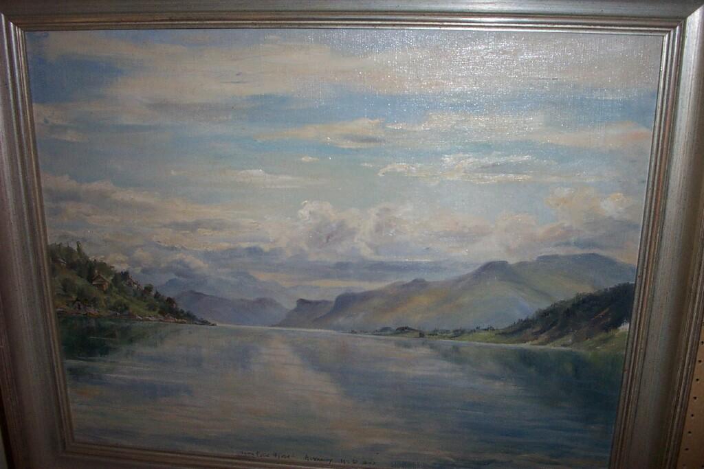 Appraisal: An oil painting on canvas of a continental lake scene