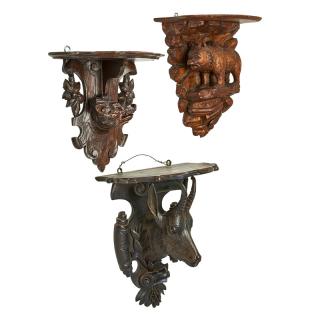 Appraisal: BLACK FOREST STYLE CARVED WALL BRACKETS Five One corner shelf