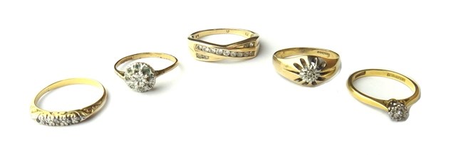 Appraisal: A gold and platinum diamond set single stone ring a