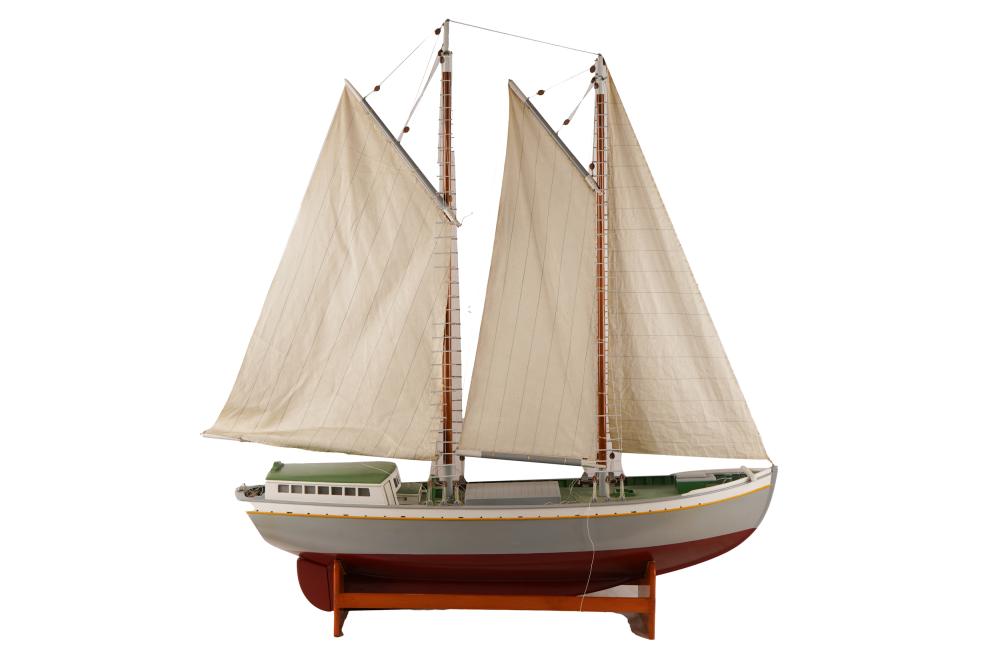 Appraisal: SAILBOAT MODELpainted wood and fabric on a wooden stand inches