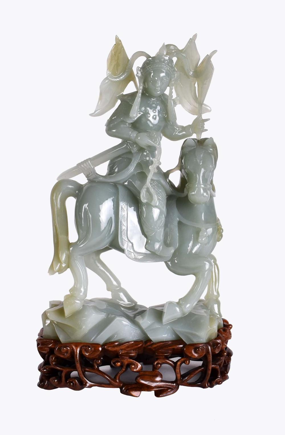 Appraisal: CHINESE CELADON JADE HORSE AND RIDER GROUPThe transparent celadon jade