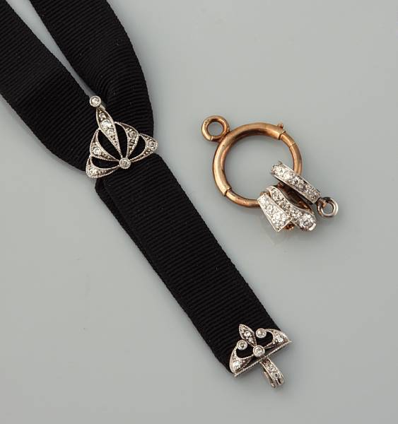 Appraisal: An Edwardian ribbon necklace with three diamond bails and a