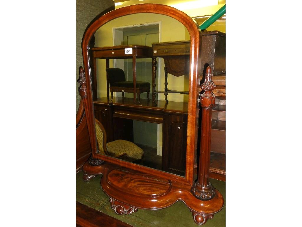 Appraisal: A Victorian mahogany toilet mirror of arched form raised on