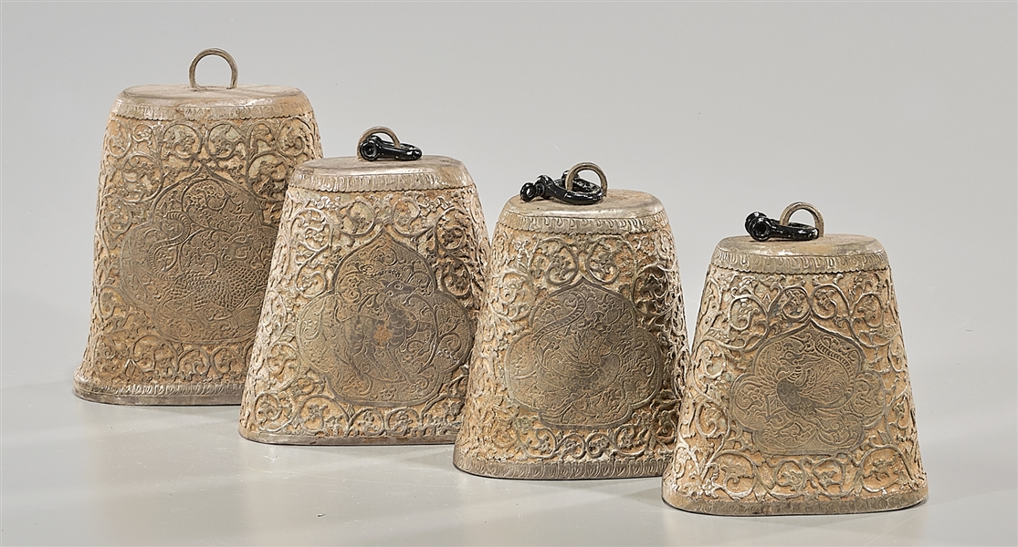 Appraisal: Four archaistic metal bells each with central design including phoenix