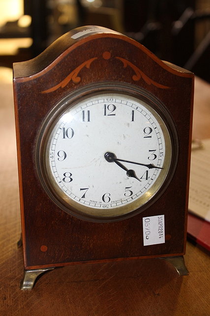 Appraisal: AN EDWARDIAN MAHOGANY DOME TOP MANTEL CLOCK with boxwood string