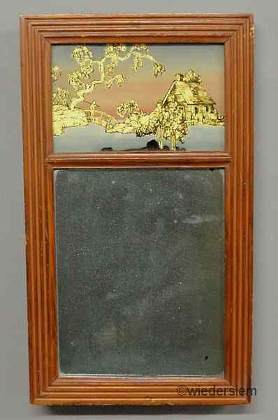 Appraisal: American carved pine mirror c with reverse painted glass panel