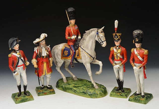 Appraisal: A GROUP OF FIVE DRESDEN PORCELAIN FIGURES of Scots Guards