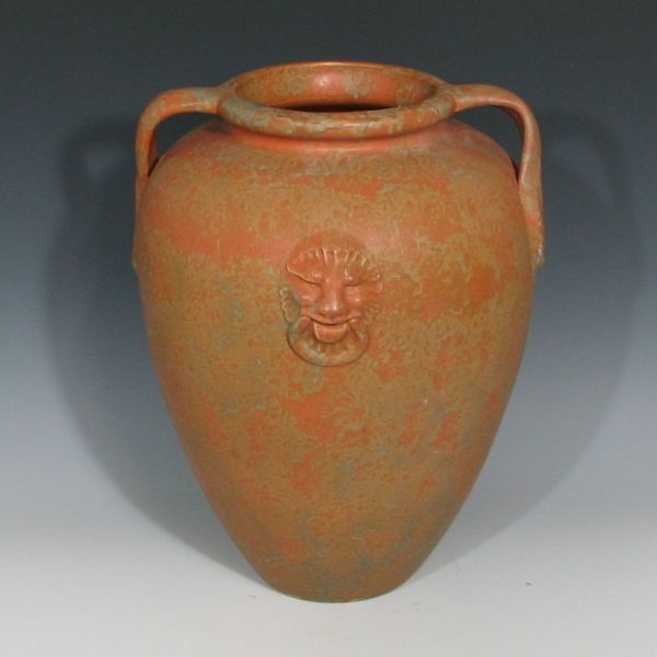 Appraisal: Burley Winter handled oil jar with lion heads Marked with