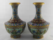 Appraisal: A pair of fine brass cloisonne shaded enamelled vases with