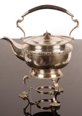 Appraisal: A circular silver tea kettle and stand London the kettle