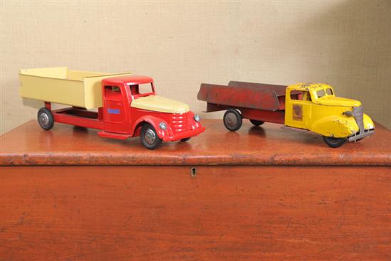 Appraisal: TWO TOY TRUCKS Both pressed steel a red and yellow