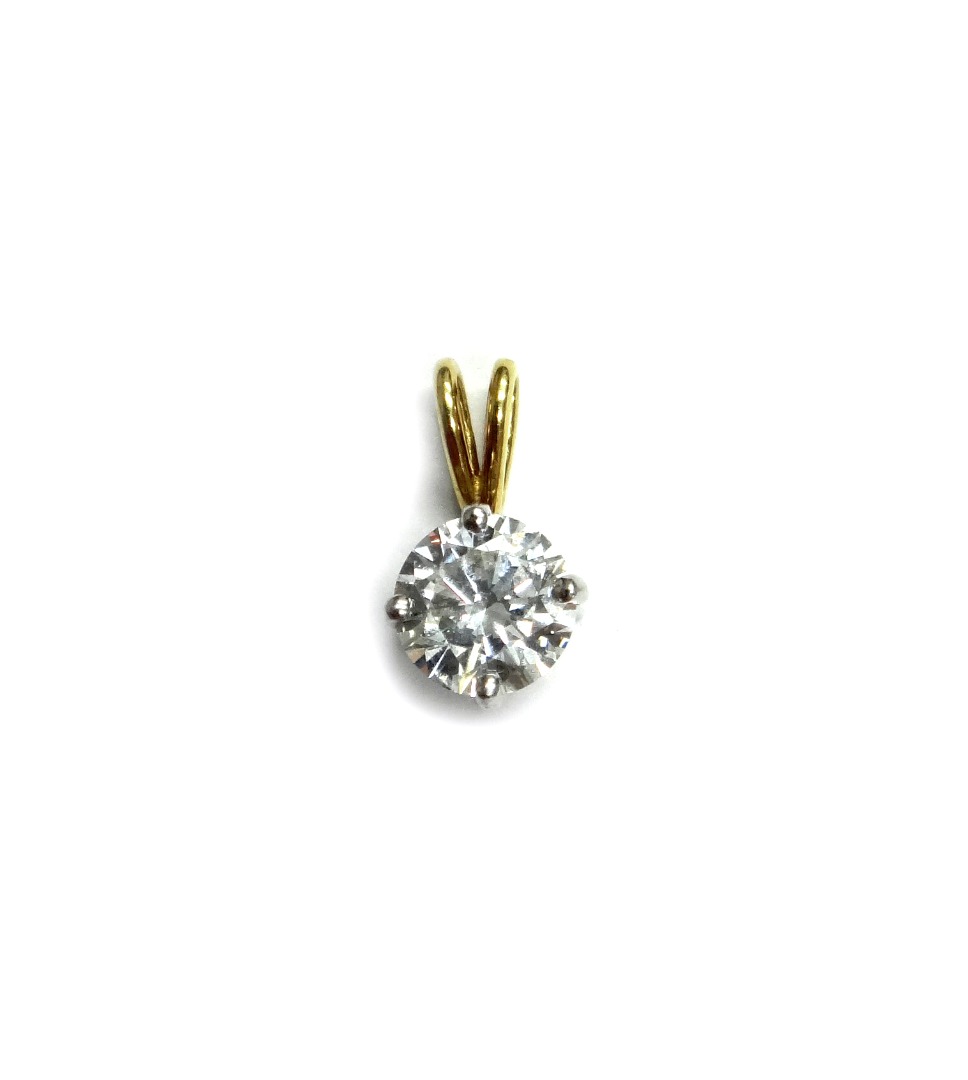 Appraisal: An ct gold and diamond pendant the round brilliant approx