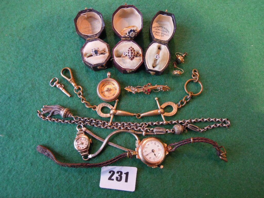 Appraisal: Two ct gold cased ladies wristwatches gilt snaffle watch chain