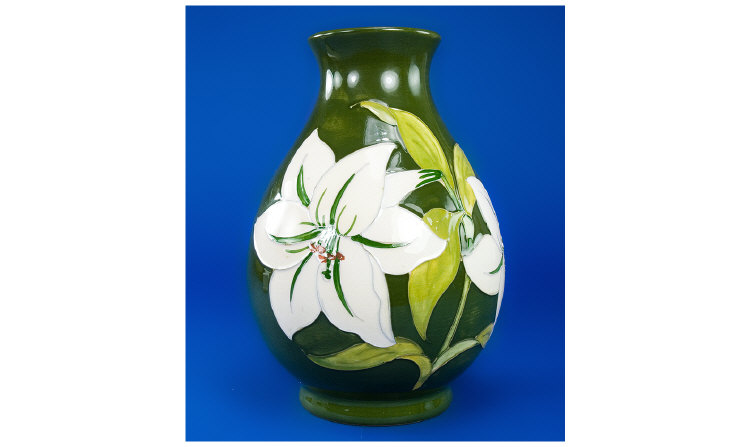 Appraisal: Moorcroft Vase Arum Lily Design on Green Ground Bulbous shape