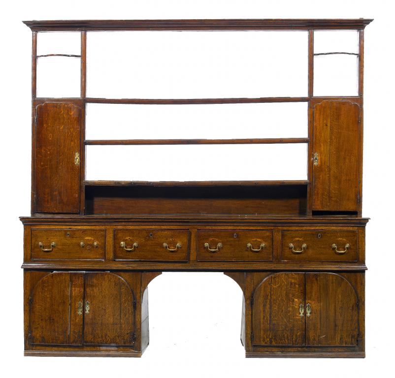 Appraisal: A GEORGE III OAK DRESSER the rack with stepped cavetto