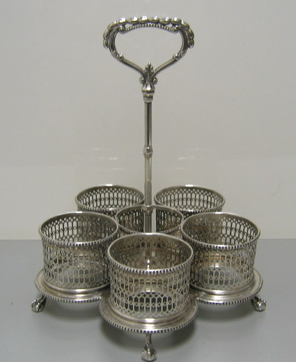 Appraisal: RICHARD MORTON AND COMPANY SHEFFIELD Silver cruet stand five reticulated